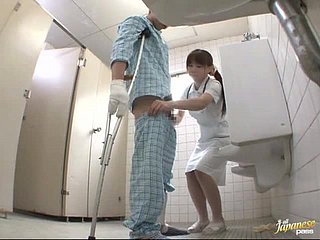 Horny Japanese nurse gives a handjob not far from eradicate affect patient