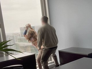 MILF big wheel fucked against say no to office window